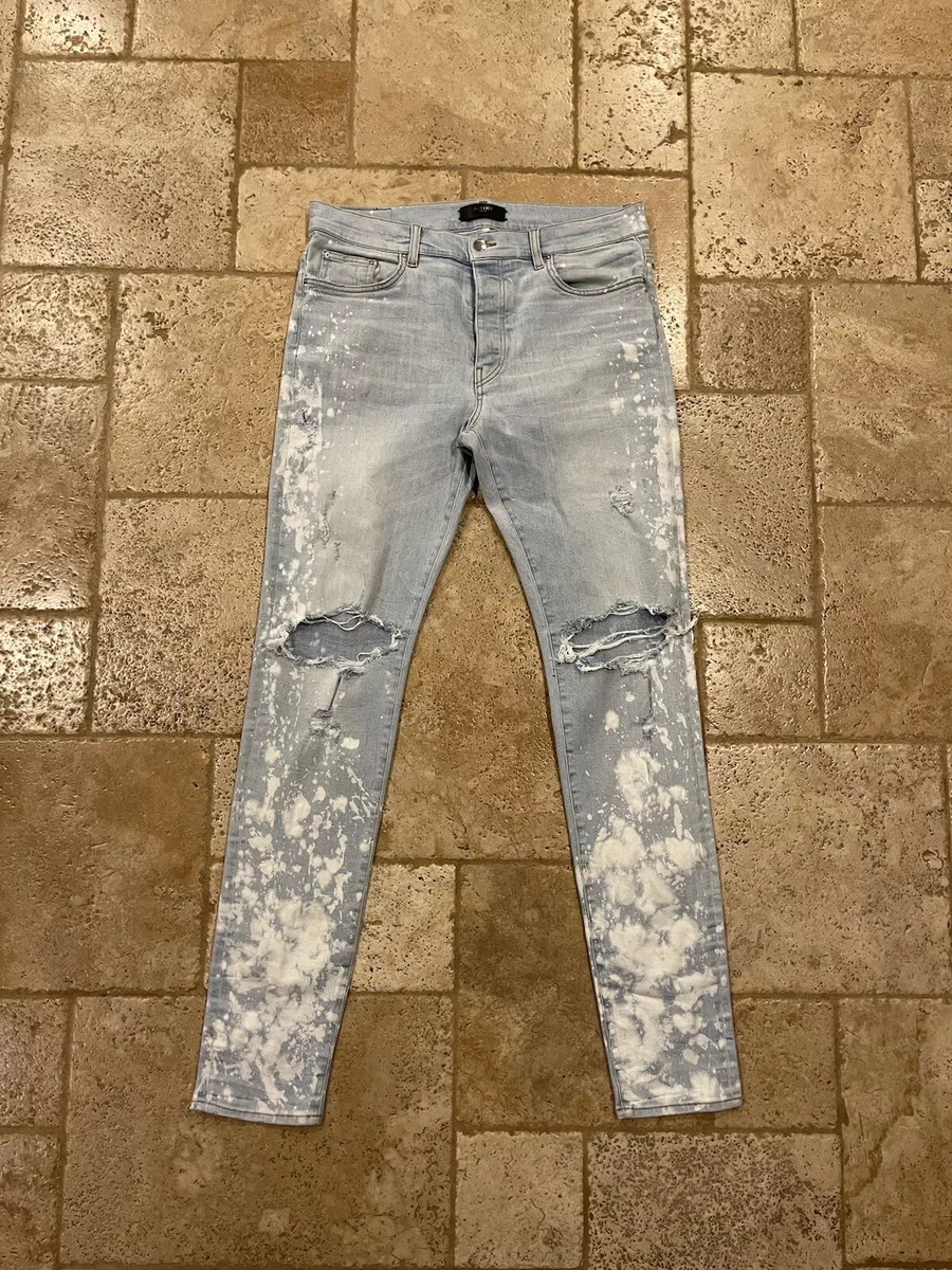 Amiri Bleached Splatter Light Wash Blue Thrasher Denim Jeans