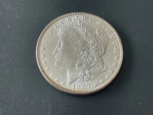 🟢 1887-P U.S. MORGAN SILVER DOLLAR EX LIGHT BURNISHING 🔴