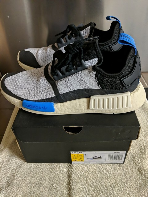gray and blue nmds