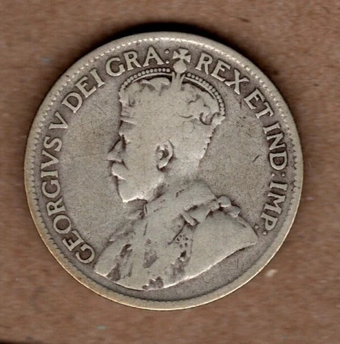 1928 Canada 25 cents George V .800 Silver.  See Photos for coin's condition.