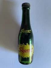 7 oz ACL green squirt bottle with boy on back Never Opened. Northampton Ma.
