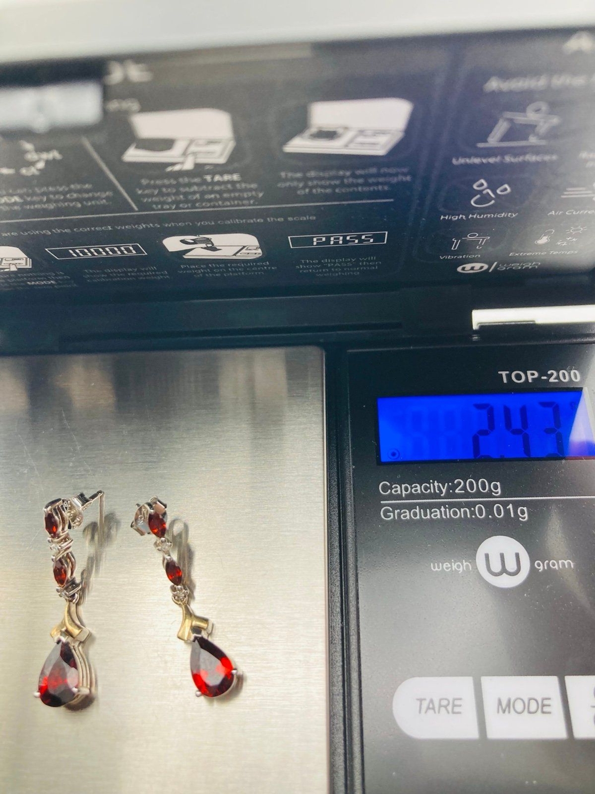 Zales natural garnet diamond earrings setting in sterling silver and 14k