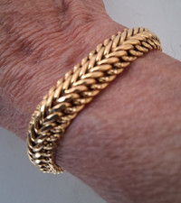 Gourmette maille américaine en  or jaune 18 carats