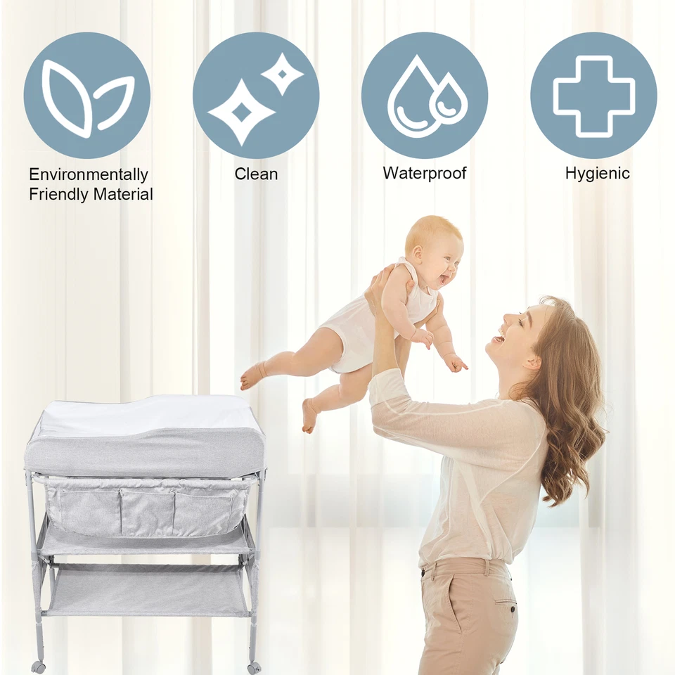Cambiador de pañales plegable para bebé con rueda bloqueable fácil de limpiar Foto 3 de 4