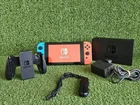 Nintendo Switch Console Bundle 32GB Neon Blue/ Red Joy-Cons, TV Dock & More