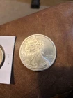 2 ounce liberty dollar and a peace dollar