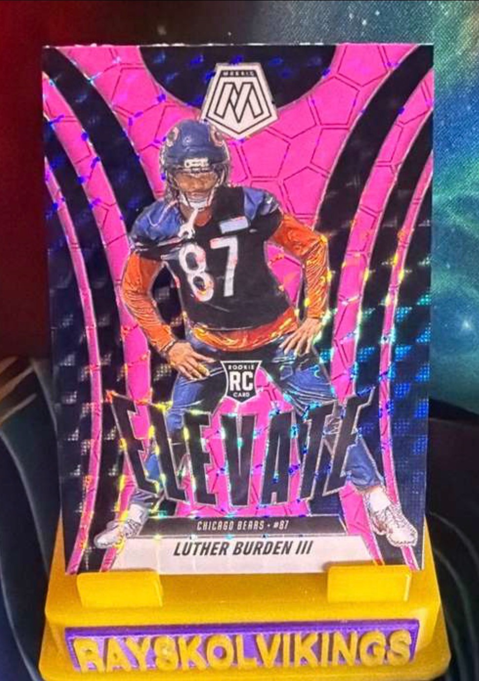 2025 Panini Mosaic Elevate Luther Burden #7 Mosaic Pink Fluorescent Prizm (RC)