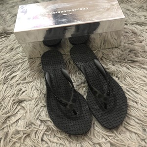 black kitten heel flip flops