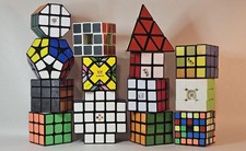 Lot de 14 Rubik’s Cube Speed Cubes 3x3 Pyraminx 5x5 X-Cross 2x2 Miroir Cube