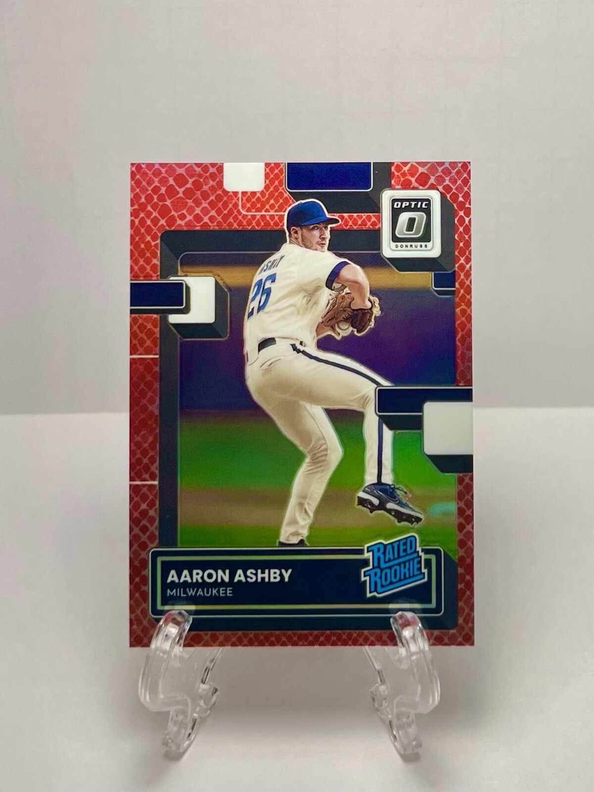2022 Donruss Optic Aaron Ashby Rated Rookie Red Dragon Prizm /99 #36 - Brewers