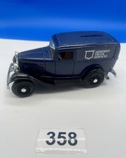 ERTL 1932 Ford Panel Delivery Truck die-cast coin bank Anheuser-Busch branding.