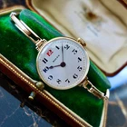 A STUNNING ANTIQUE 1916-1917 LADIES ROLEX DRESS WATCH IN 15K GOLD WITH BOX