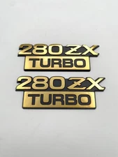 Datsun 280zx turbo 1981-1983 gold fender emblem set, nos