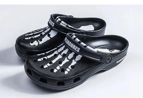 black designer crocs