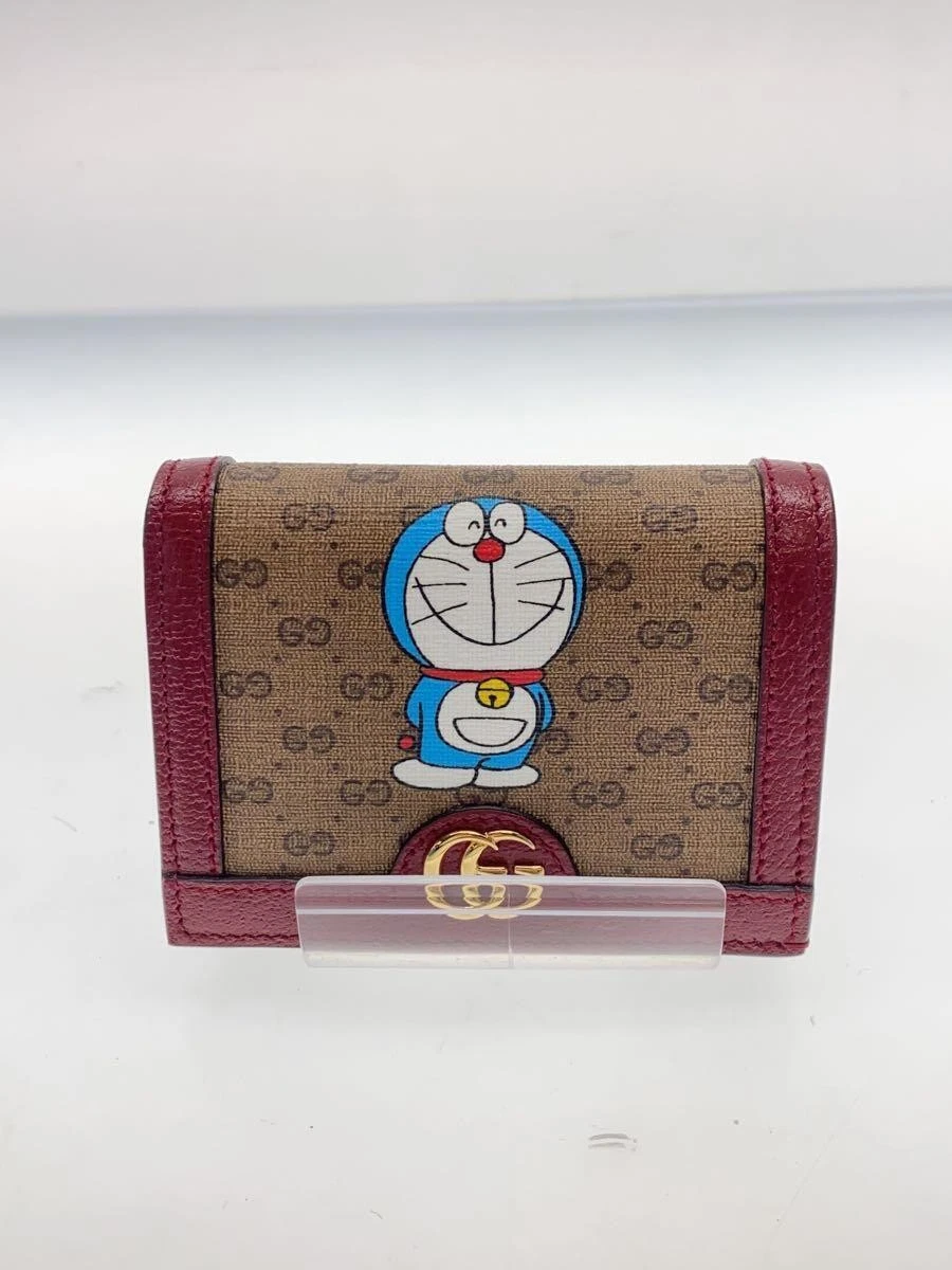 Portefeuille GUCCI à deux volets Mini GG Supreme