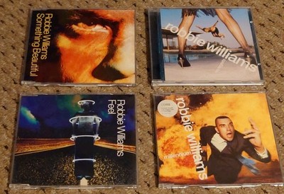 ROBBIE WILLIAMS:4xCD singles:Feel, something beautiful, millennium,no regrets 
