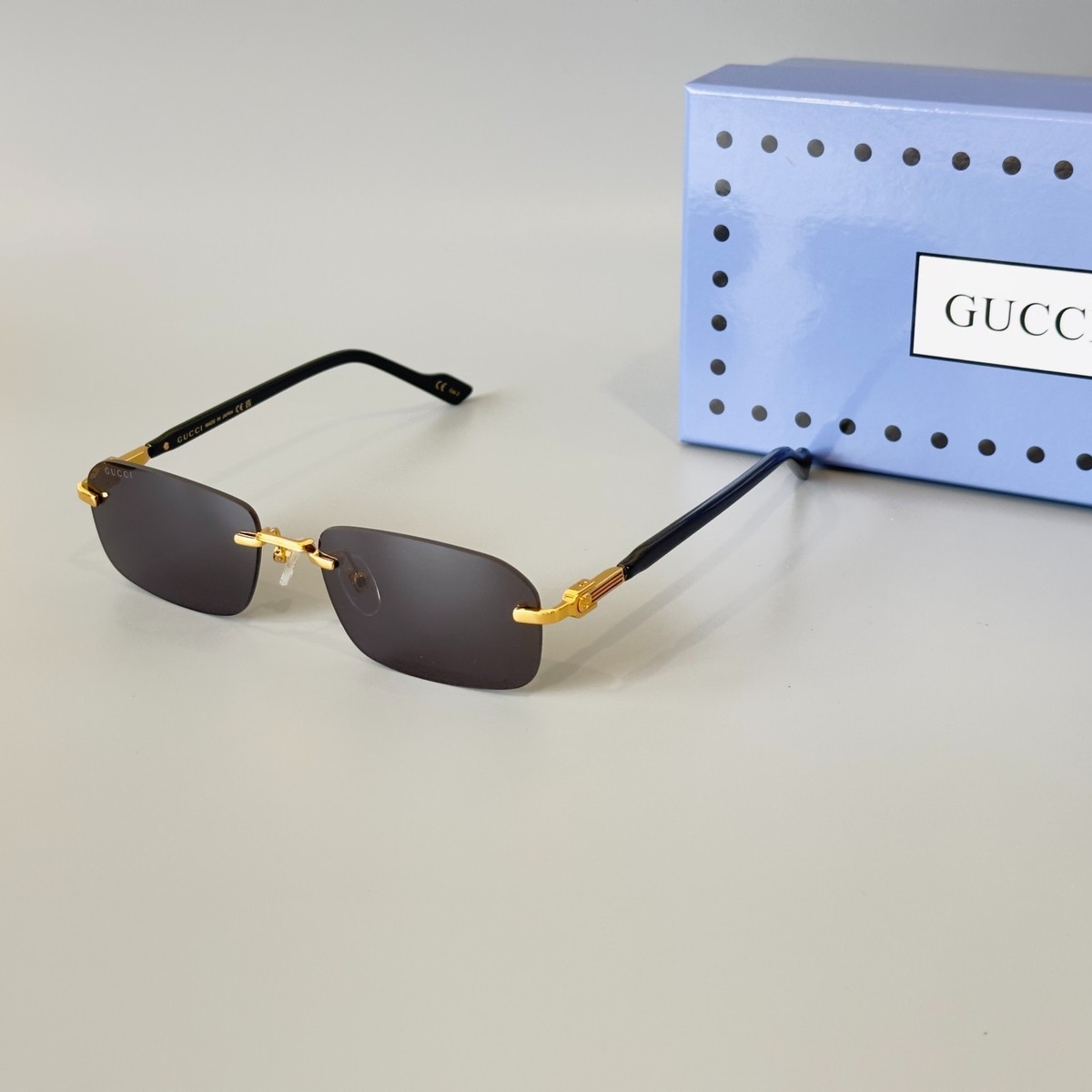Gucci GG1221S 001 Black Gold Rimless Sunglasses Gray Lens 56mm | eBay Gucci GG1221S 001 Black Gold Rimless Sunglasses Gray Lens 56mm | eBay