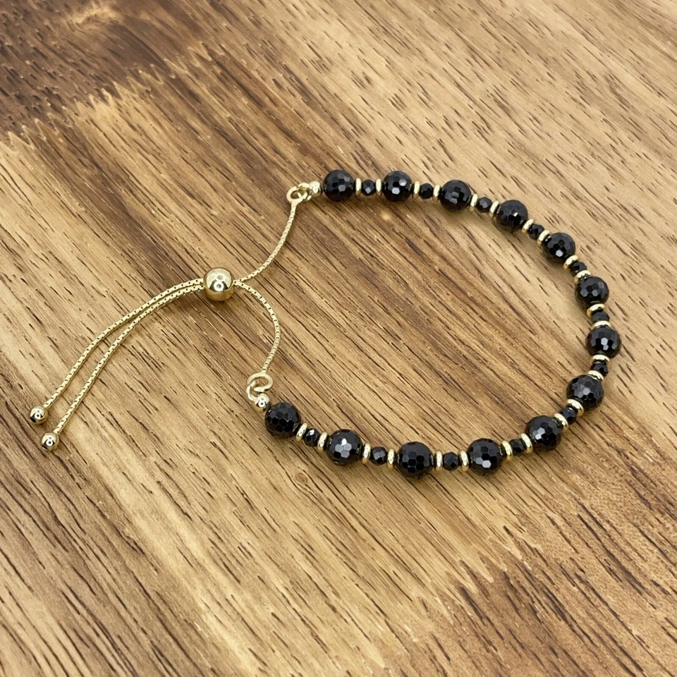 Pulsera Bellezza Negra Espinela Bronce Cuentas Oro Rondellas Ajustable HSN Foto 3 de 4