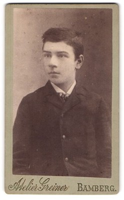 Photography studio Greiner, Bamberg, boy in coat looking to the side 