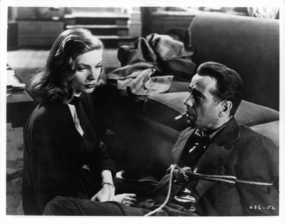 Lauren Bacall sitting tied up Humphrey Bogart a scene film The Big- Old Photo