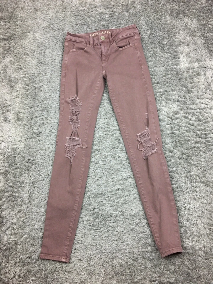 Pantalones de mezclilla American Eagle Jegging para mujer talla 0 rosa/marrón súper elásticos desgastados Foto 3 de 4