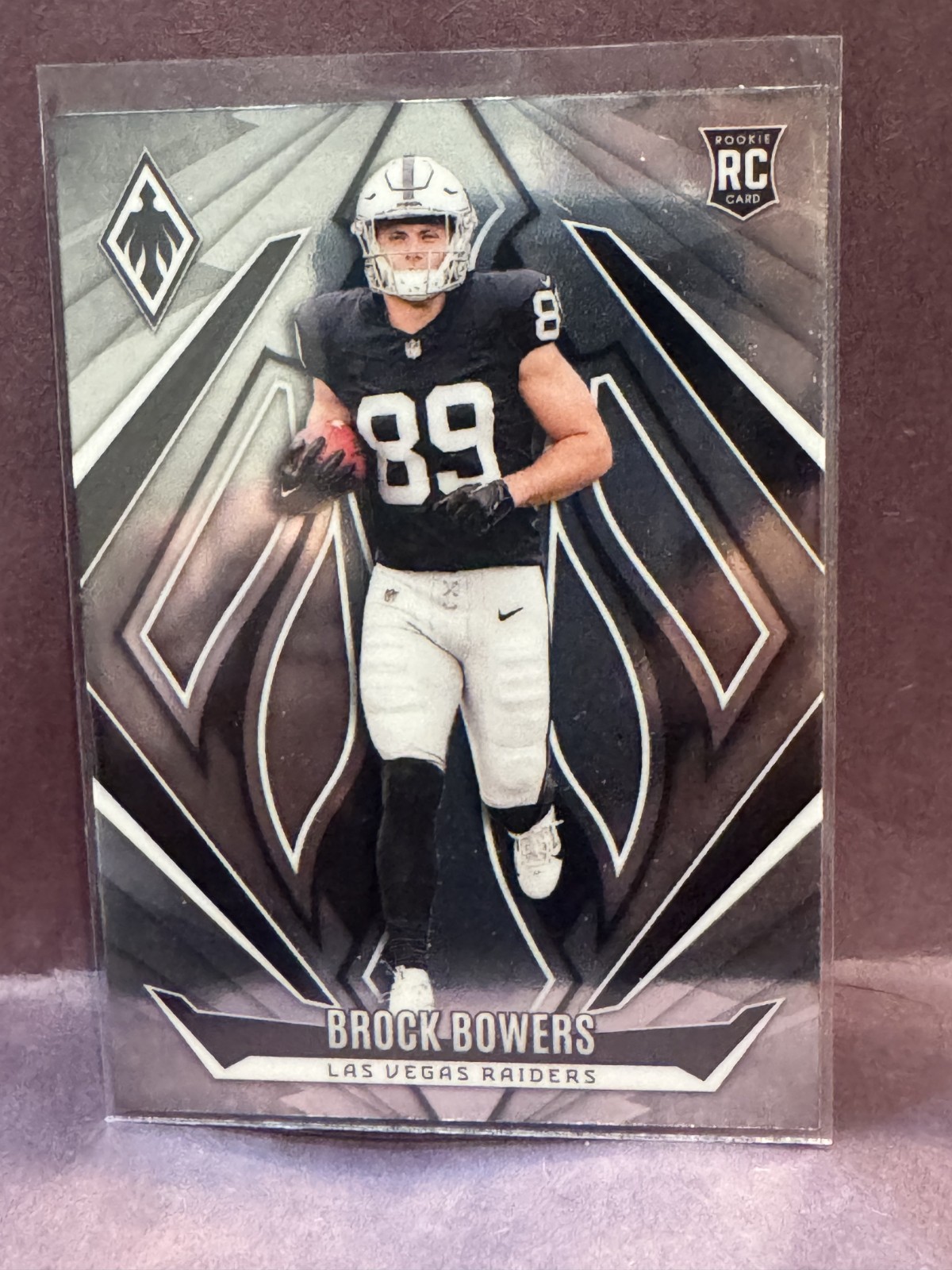 2024 Panini Phoenix - Rookies Brock Bowers #165 Silver (RC)