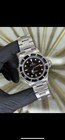 Rolex Submariner 16610T Silver Oyster Bracelet with Black Bezel