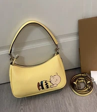 Coach x Peanuts Teri Shoulder Bag – Charlie Brown on Pebble Leather  – Outlet