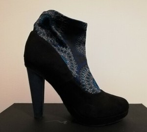 scarpe tacco desigual