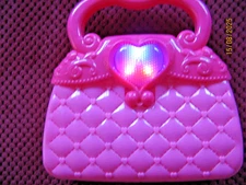 Pink Plastic toy Purse with flashing Red Heart-Quilted texture look-unbranded