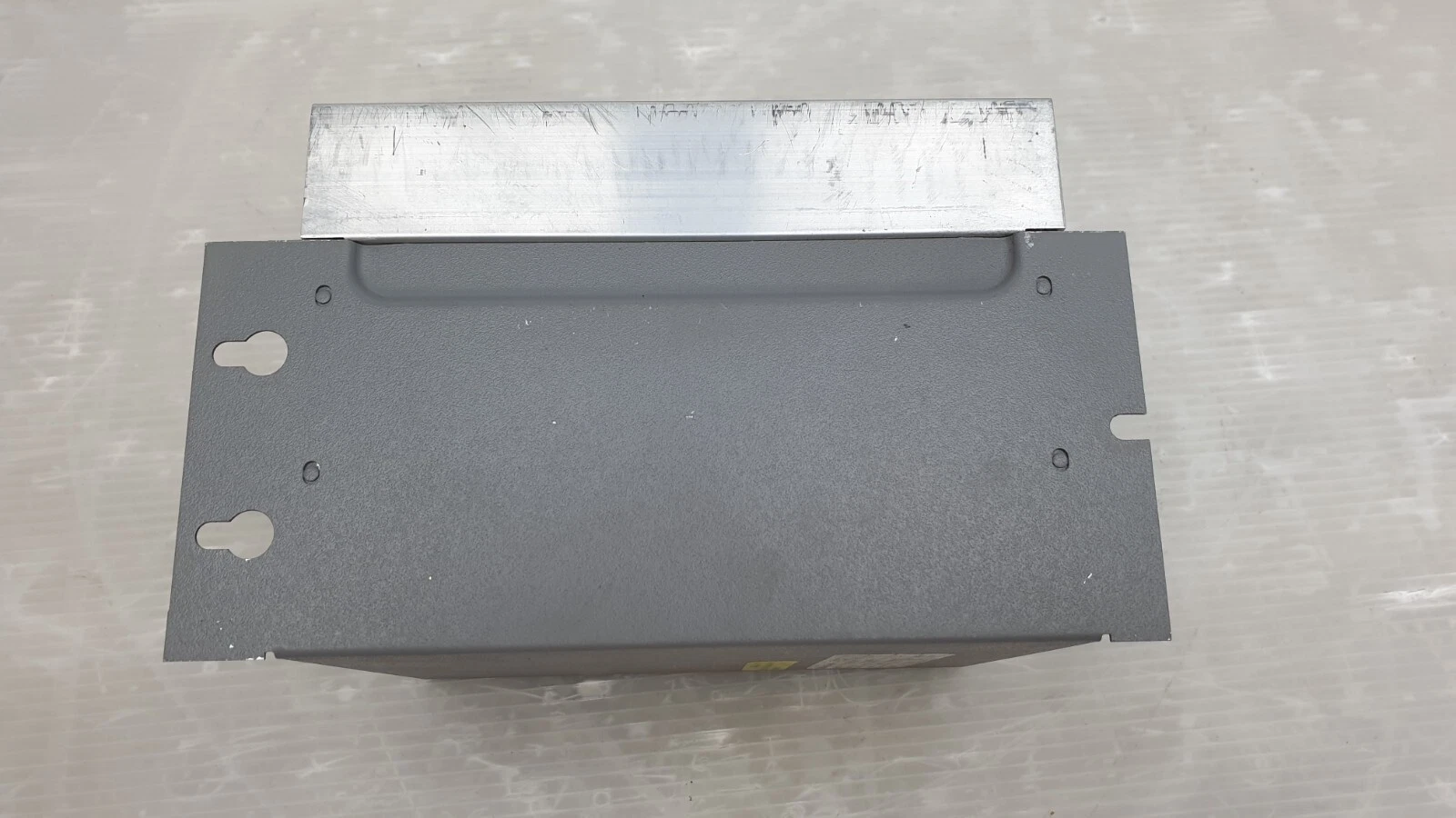 Mounting plate on the back of the Giddings & Lewis Micro DSA drive