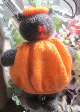 A PUMPKIN HALLOWEEN KITTEN. ALL HAND KNITTED.
