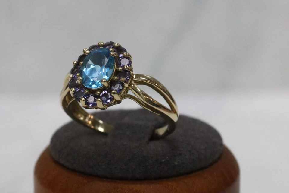 Anillo con racimo de topacio azul y tanzanita de oro amarillo de 9 quilates - Talla P Foto 2 de 4