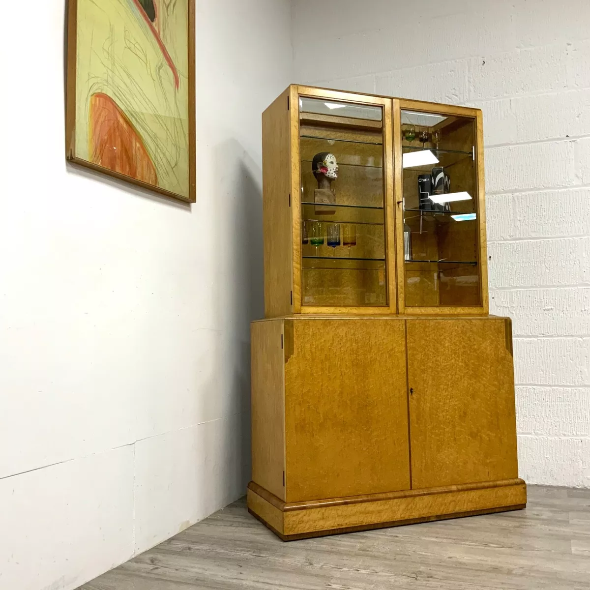 Original Art Deco bird eye Maple display cabinet by H L Epstein