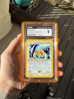 2002 POKEMON NEO DESTINY 1ST EDITION #14 LIGHT DRAGONITE HOLO CGC 9 MINT