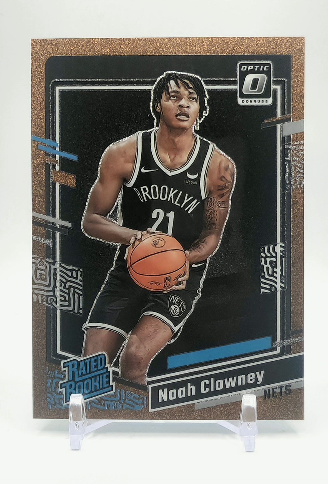 2023-24 Donruss Optic Noah Clowney Copper Glitter Prizm RC Rated Rookie #/99