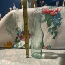 Clear Glass Bottle 8 oz Embossed Base Approx. 7 Inch Tall Collectible Modern