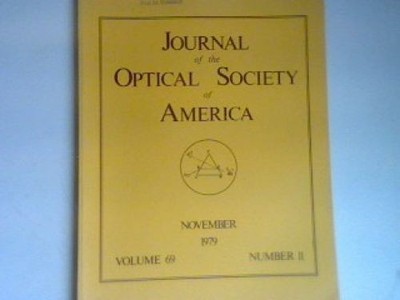 Light eission by a magnetic and electric dipoles close to a plane dielectric int
