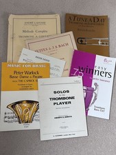 Tenor Trombone Mutes, music books and trombone stand