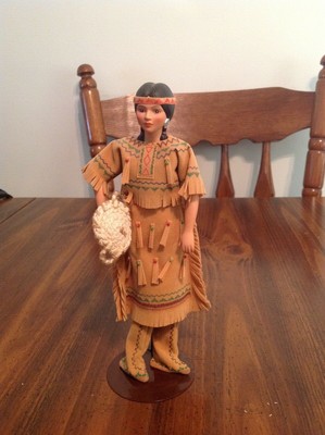 avon international porcelain doll collection