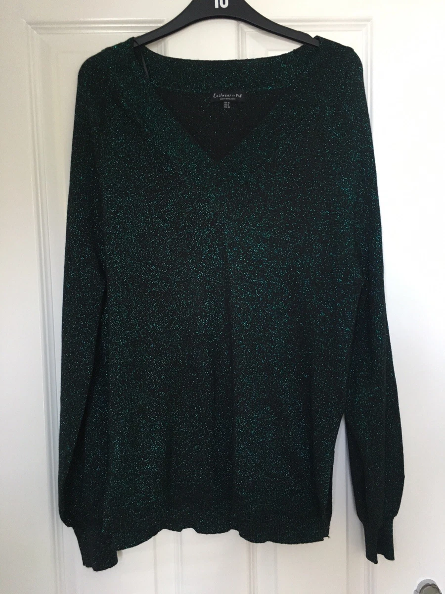 Stylish Florence and Fred black jumper with green glitter detail. Size 10
