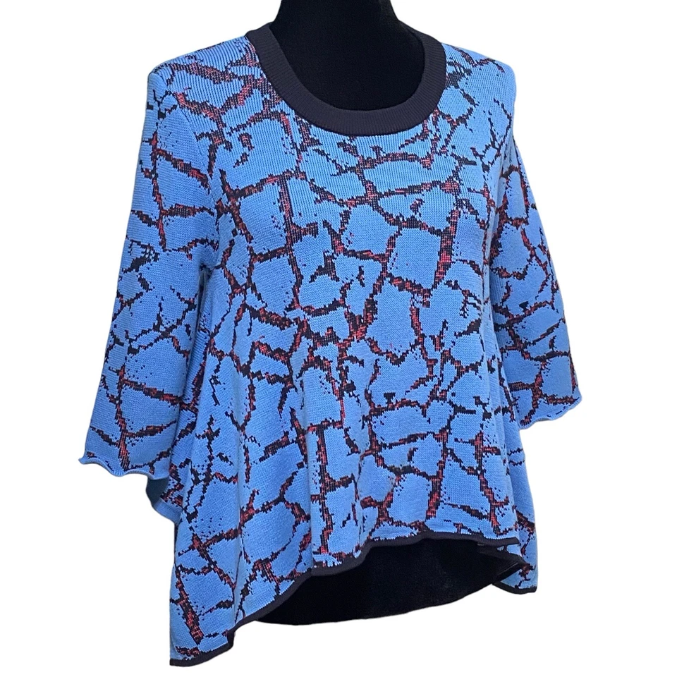 Blusa suéter cropped assimétrica malha rachada cerimônia de abertura azul grande - Imagem 2 de 4