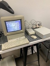 Extensive Apple IIgs setup including computer, monitor, printer, keyboard, mouse