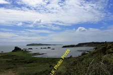 Photo 6x4 Lagavulin Bay Dunyvaig castle on the left, Lagavulin and the pi c2015