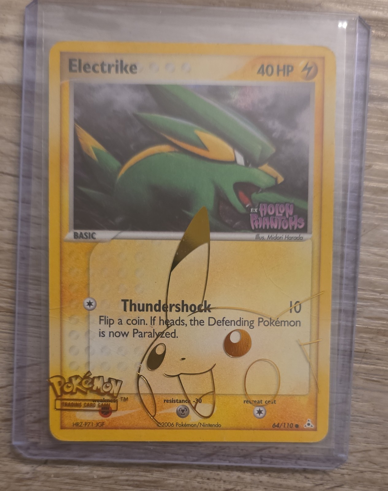 Electrike 64/110 EX Holon Phantoms Reverse Holo