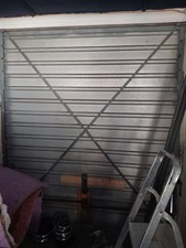 Red Garage Door manual Up and over Mechanism.