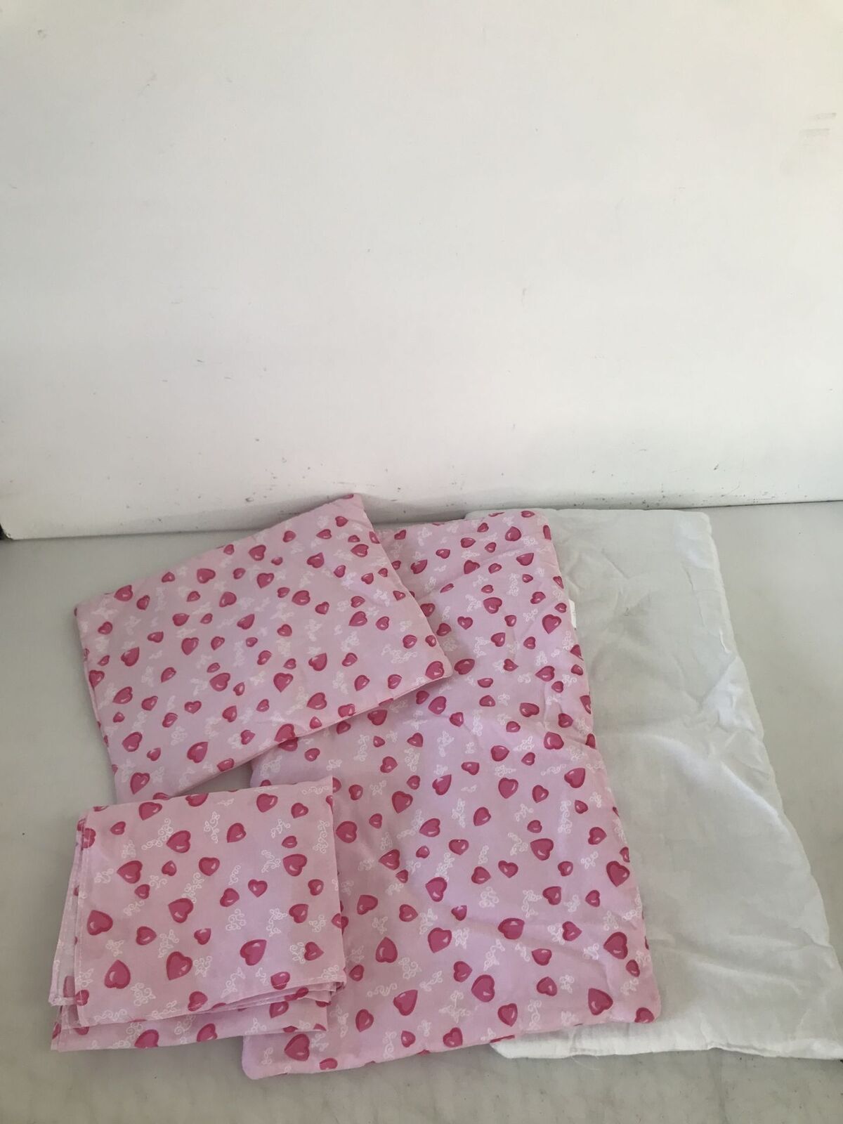 Lenzuola per bambole Pinolino 4 pezzi ""cuore"" in rosa