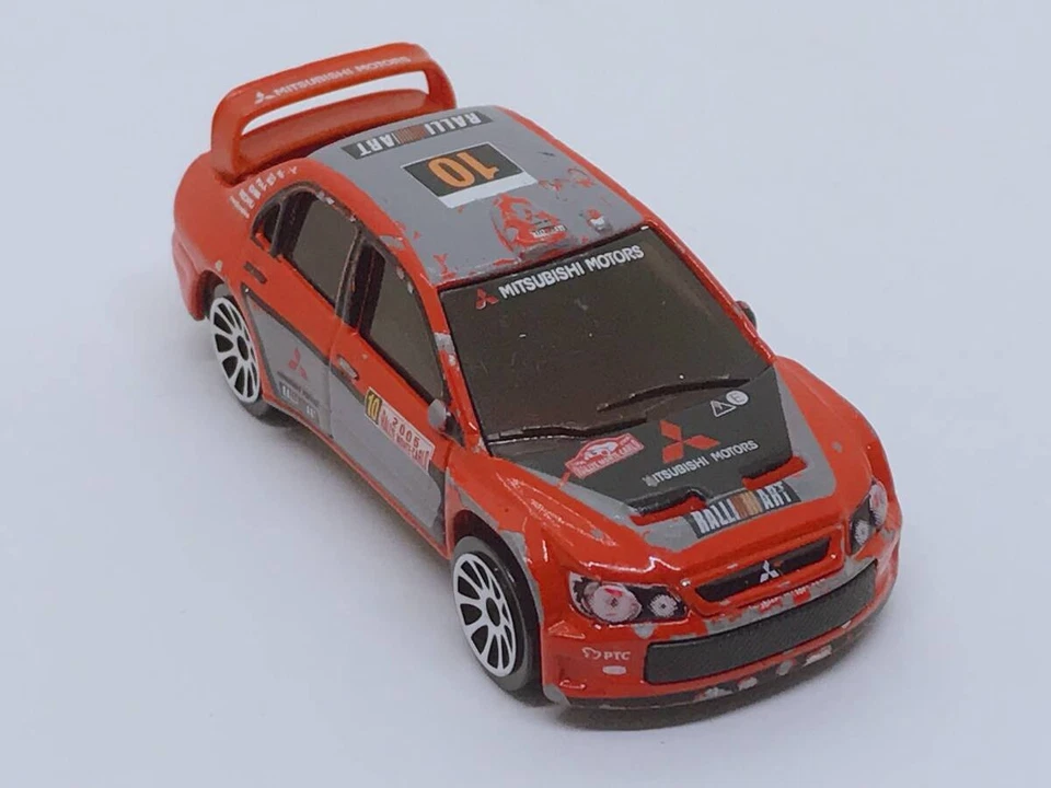 Un'auto pressofusa taglia 14 Tomica Majorette Mitsubishi Lancer WRC Ralliart ... - Immagine 4 di 4