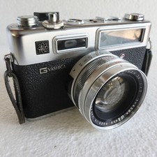 Two YASHICA ELECTRO 35 35MM Film Cameras for parts only with accessories