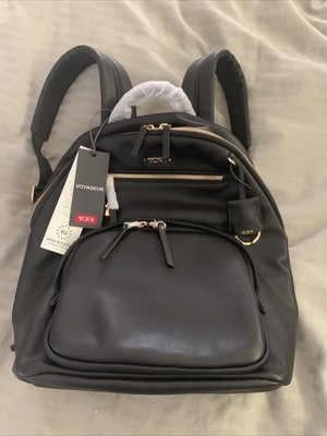 tumi black and gold backpack